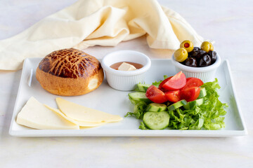 Breakfast plate on white wooden background