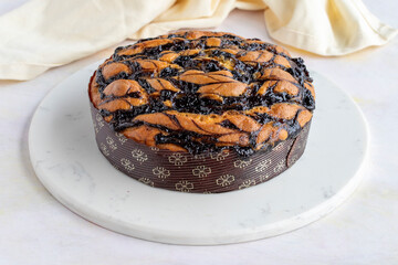 Chocolate cake on a white wood background