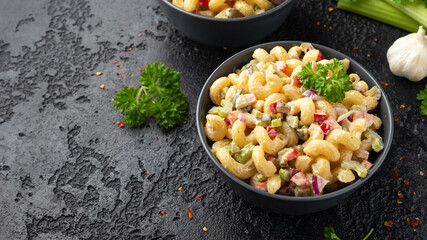 Macaroni Salad with red bell pepper, onion, celery, gherkins and mayonnaise dressing