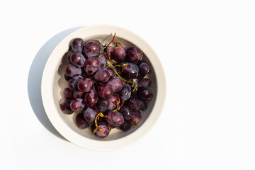 Soak grape in water. Washing fruit concept