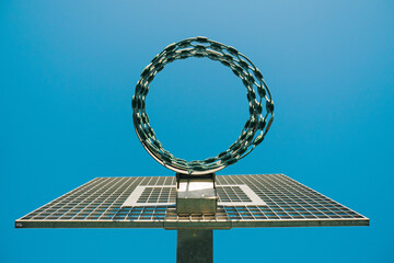 Basket Ball Hoop against blue sky