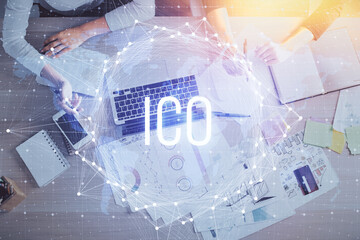 Double exposure of woman hands working on computer and blockchain theme hologram drawing. Top View....