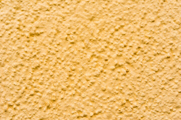 Rough yellow wall