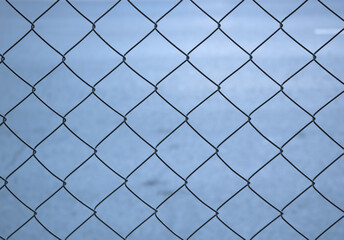 metal net of grids isolated over a blank background - industrial pattern	