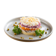 Isolated plate of russian herring under fur coat salad shuba