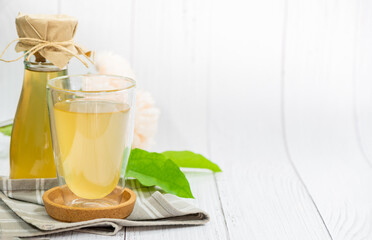 Kombucha tea with Tiliacora triandra or Bamboo grass leaf, cider fermented drink.