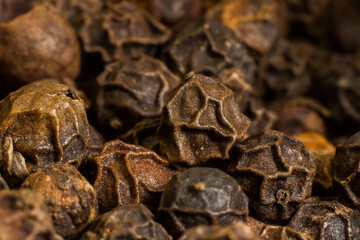 closeup of black and red peppercorns. macro photography. Spices for cooking food.