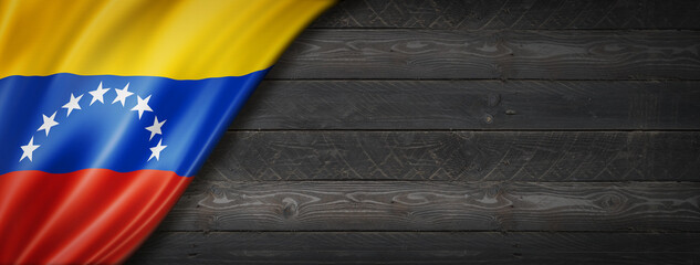 Venezuelan flag on black wood wall banner - obrazy, fototapety, plakaty