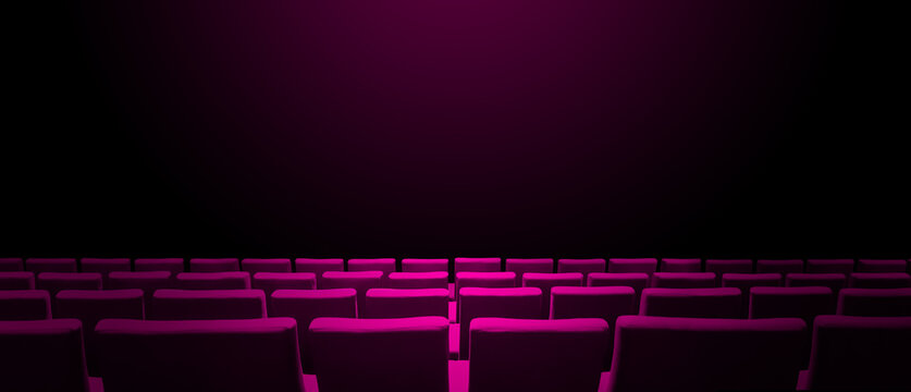 Cinema movie theatre with pink seats rows and a black background. Horizontal banner