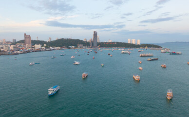 Aerial view of Pattaya sea, beach in Thailand in summer season, urban city with blue sky for travel...
