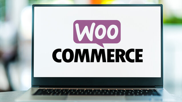 Laptop computer displaying logo of WooCommerce