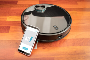 Automatic vacuum cleaner robot to clean the floor and help in housework controlled by an smart...