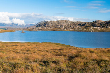 Loch Tollie in Wester Ross, on the west coast of Scotland and the Atlantic Ocean.