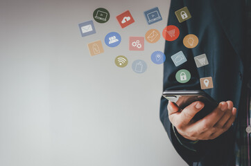 Man using phone payment shopping online and network connection icon on hologram virtual screen.Digital marketing sales ideas online.