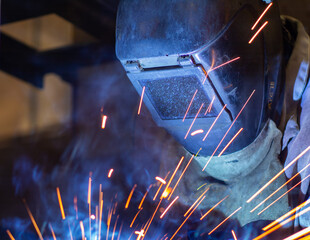 a welder in a mask