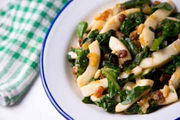 Squid with chard traditional Spanish tapa