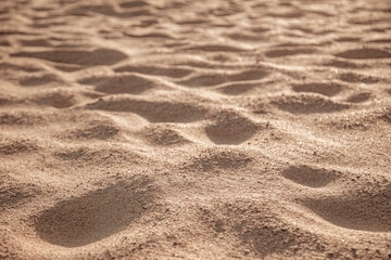 Abstract sand background concept, Vintage tone pattern of sand affected by the sun On sunny holiday at a tropical beach in southern Thailand. Soft focus. Motion Blur