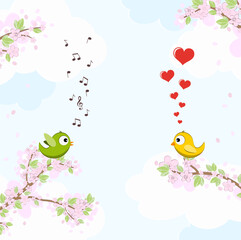 Birds in love on blossom branches