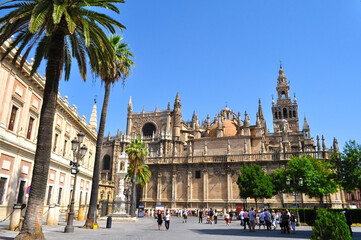 Seville Cathedral on Triumph Square, Spain - obrazy, fototapety, plakaty