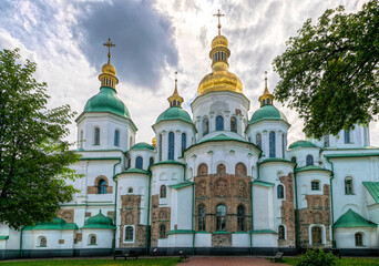 Fototapeta na wymiar Kyiv, Ukraine - May 14, 2021: Saint Sophia Cathedral in Kiev, Ukraine. The famous historical monument, built by Prince Yaroslav the Wise in 1037. Ancient Christian Orthodox churches with golden domes