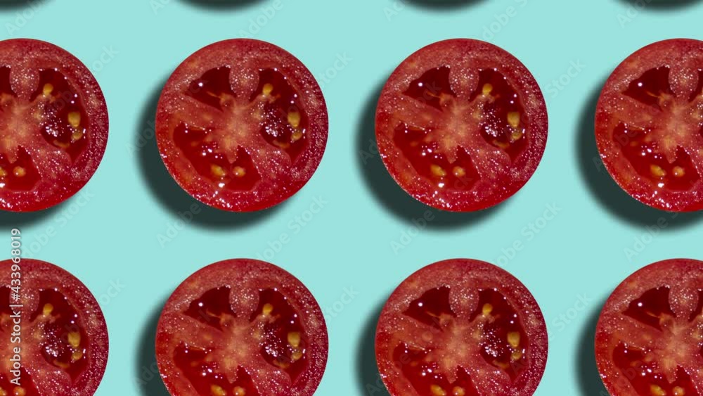 Poster geometric pattern with tomato slices on a pale blue background. minimal motion graphic food concept 