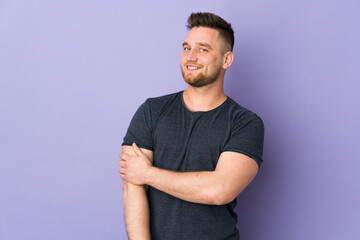 Fototapeta premium Russian handsome man over isolated background laughing