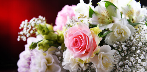 Composition with bouquet of freshly cut flowers