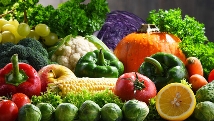 Obraz na płótnie Canvas Composition with variety of fresh organic vegetables and fruits