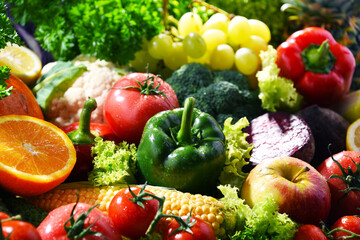 Naklejka na ściany i meble Composition with variety of fresh organic vegetables and fruits