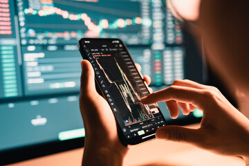 Closeup - Woman is checking Bitcoin price chart on digital exchange on smartphone, cryptocurrency...