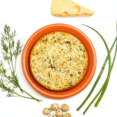 Casserole with cheese and herbs isolated on white background. View from above.