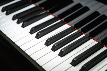 Piano keys on classical grand piano - closeup of piano keyboard for pianist, concert, music production and recording concept