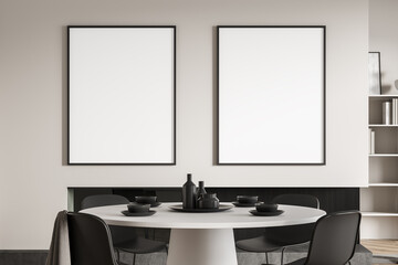 Light dining room interior with minimalist furniture, mockup posters