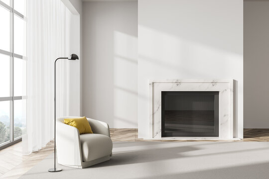 White living room interior with armchair and fireplace, mockup