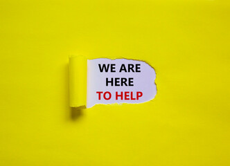 Support symbol. Words 'we are here to help' appearing behind torn yellow paper. Beautiful yellow background. Business and support concept. Copy space.