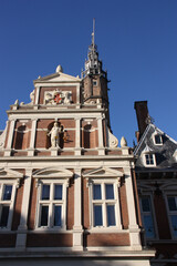 Fototapeta na wymiar Façade brique et pierre à Haarlem, Pays-Bas
