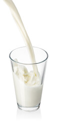 milk pouring into glass isolated on white