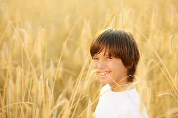 Kid at wheat field