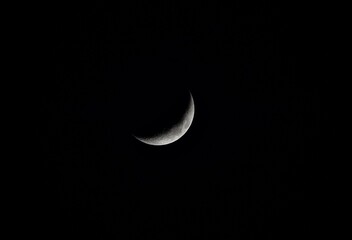 Obraz na płótnie Canvas new moon in the night sky