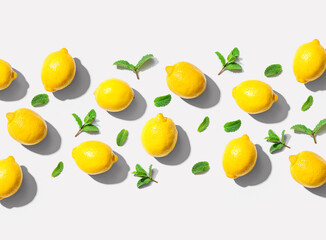 Fresh yellow lemons with mints overhead view