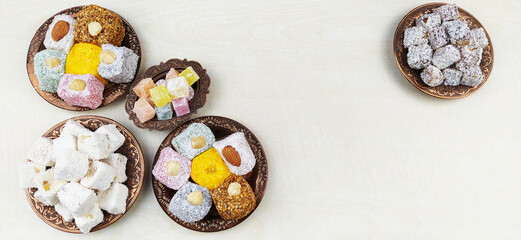 Traditional Turkish Delight, Turkish Sweet Sugar Ramadan (Ramadan) Dishes. Presentation on an antique plate.