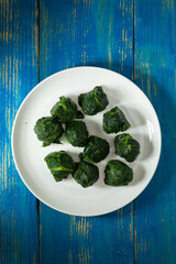 Frozen spinach on the plate.