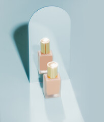 Skin foundation bottle next to mirror on blue background