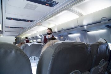 The interior of the aircraft.View from the passenger side, who is sitting on the plane.