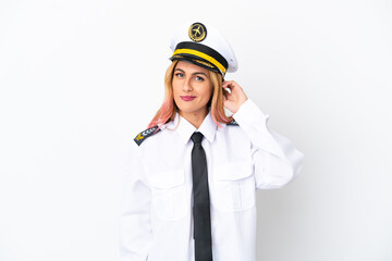 Airplane pilot over isolated white background having doubts