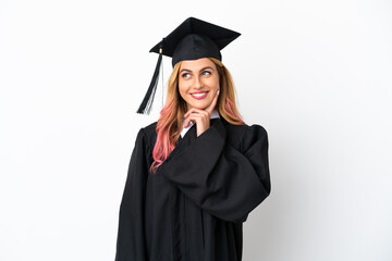 Young university graduate over isolated white background thinking an idea while looking up