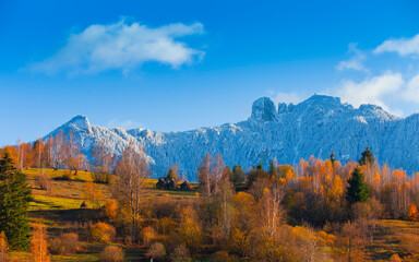 Mountain lanscape in november. Late autumn scene with snow on Ceahlau mountain, Romania