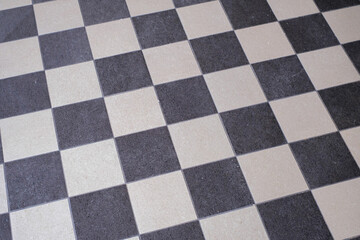 a black and white chess pattern of a floor