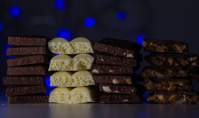 
chocolate bar, white, milk, with nuts, with caramel