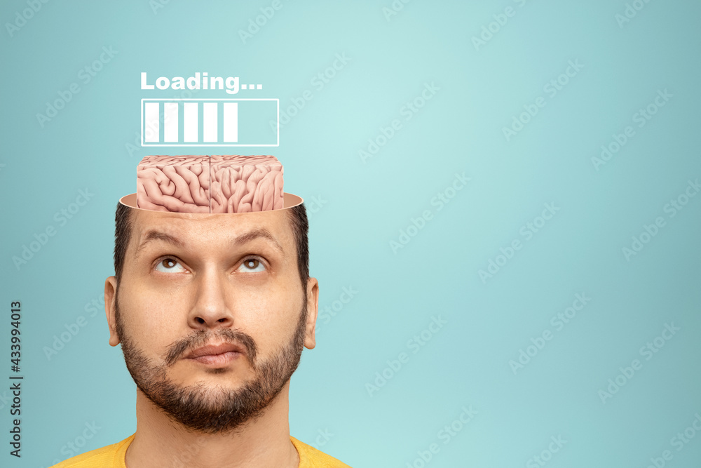Poster in the man's head is an image of the brain and a loading scale. concept for education, reading, exam